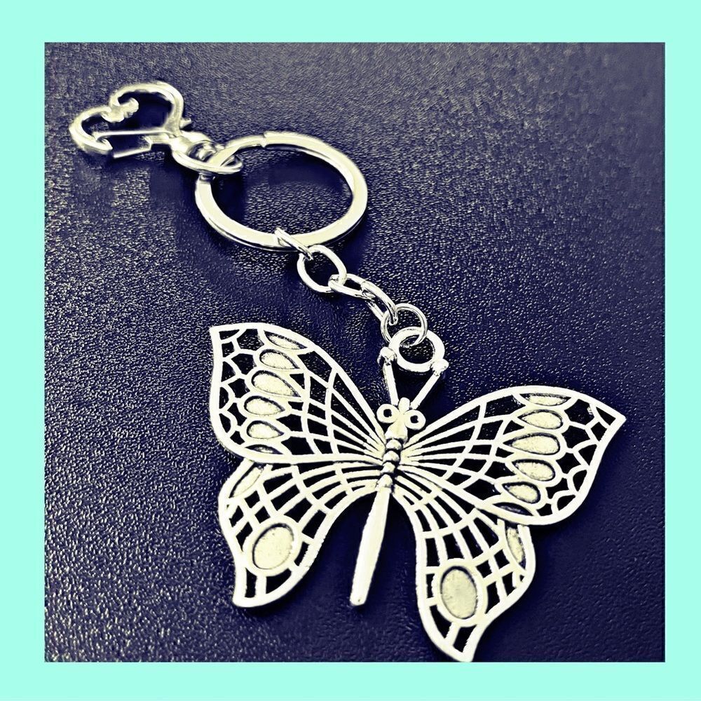 *30off3* NWOT. Beautiful Silver Tone Butterfly Keychain/Accessory.
